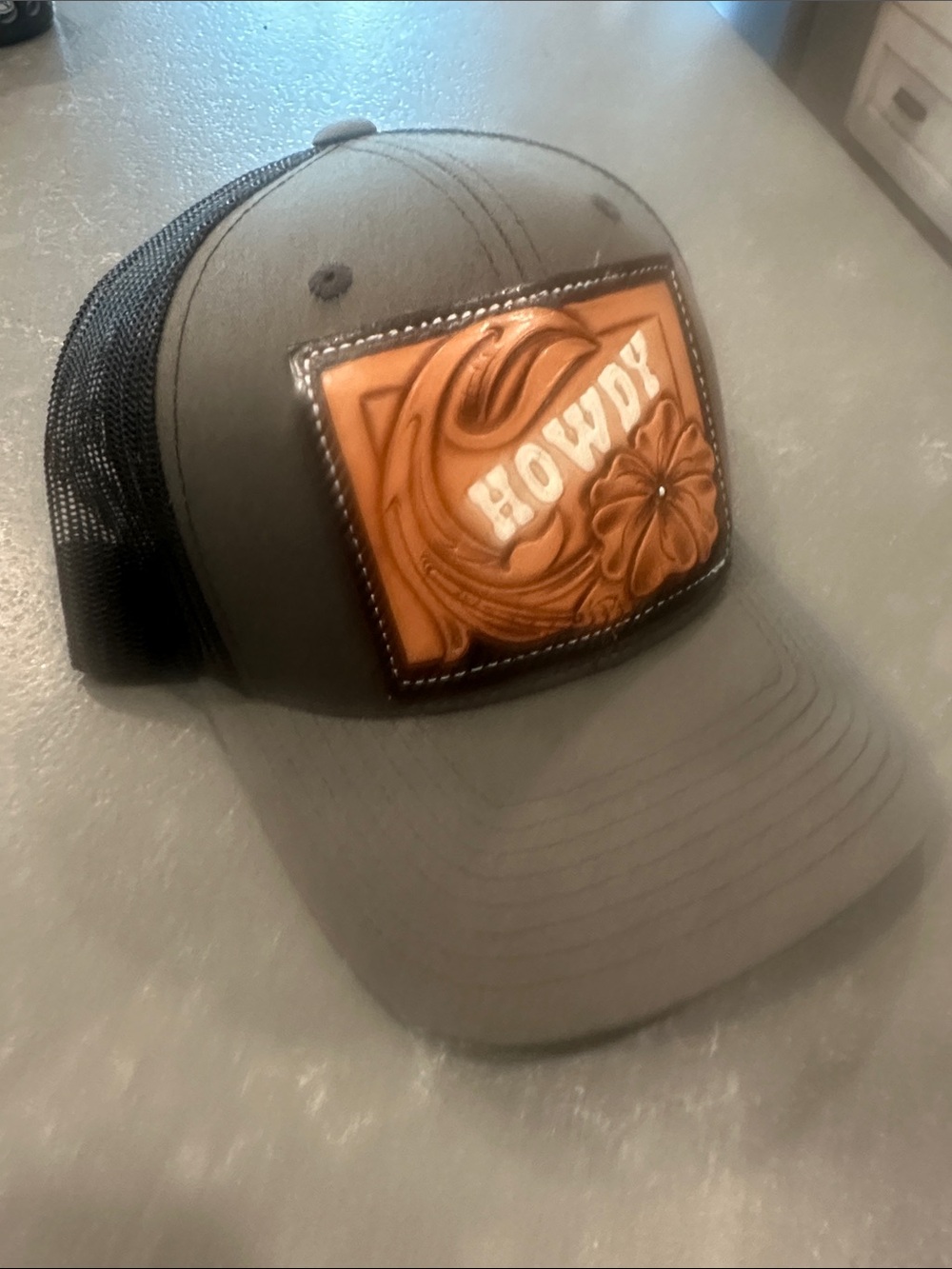Gray\Black Trucker Hat with Tan Leather Patch - HOWDY